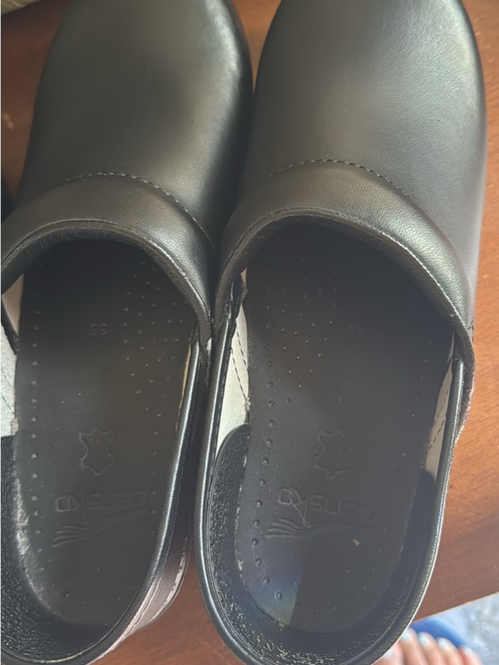 Dansko Black Leather Slip-On Clogs